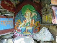 White Tara in grotto - click for a larger image